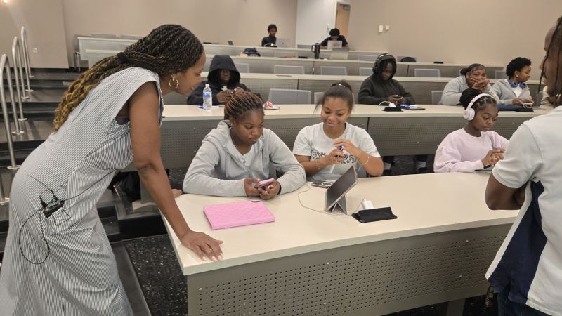 Youth interns collaborating at classroom tables during the TAG-Ed AI Boot Camp
